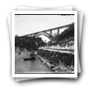 Barcos rabelos no rio Douro, vendo-se a Ponte D. Maria Pia, Porto
