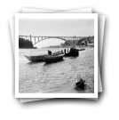 Panorâmica de barco no rio Douro no dia da inauguração da Ponte da Arrábida 