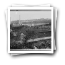 Vista parcial da ponte sobre o rio Vizela, vendo-se a fábrica (reprodução de prova)